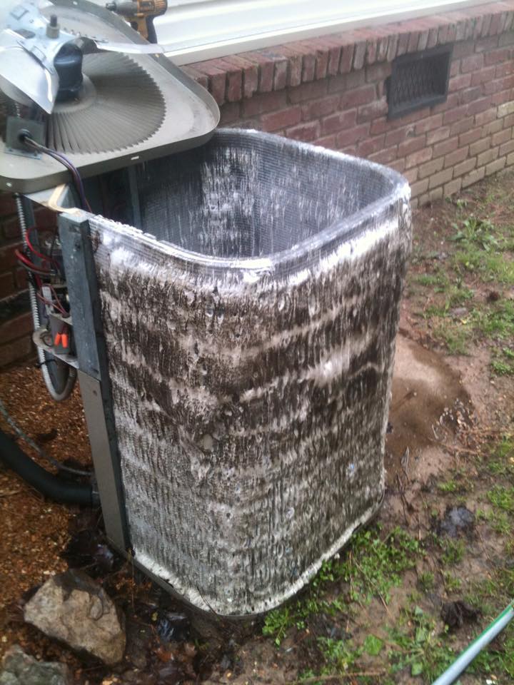 A dirty air conditioner unit.