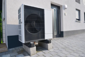 An outdoor heat pump unit installed outside a home.